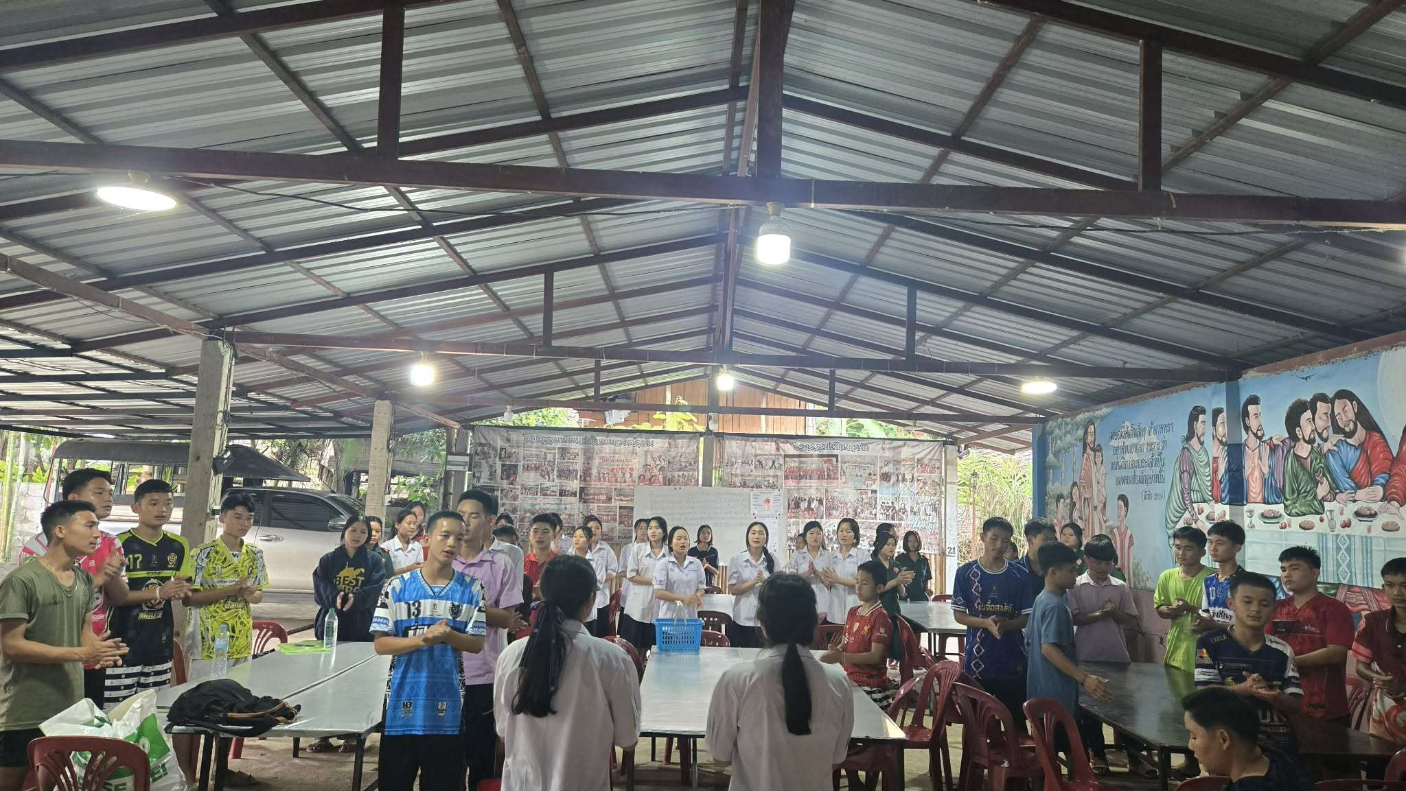 Singing songs of praise to God in the evening.