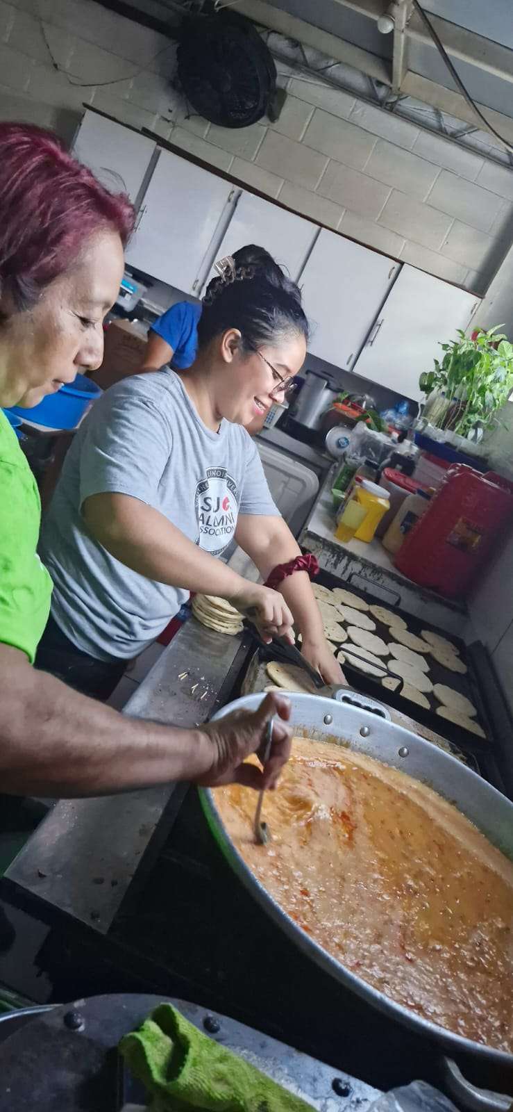 Marta making tortillas for the children