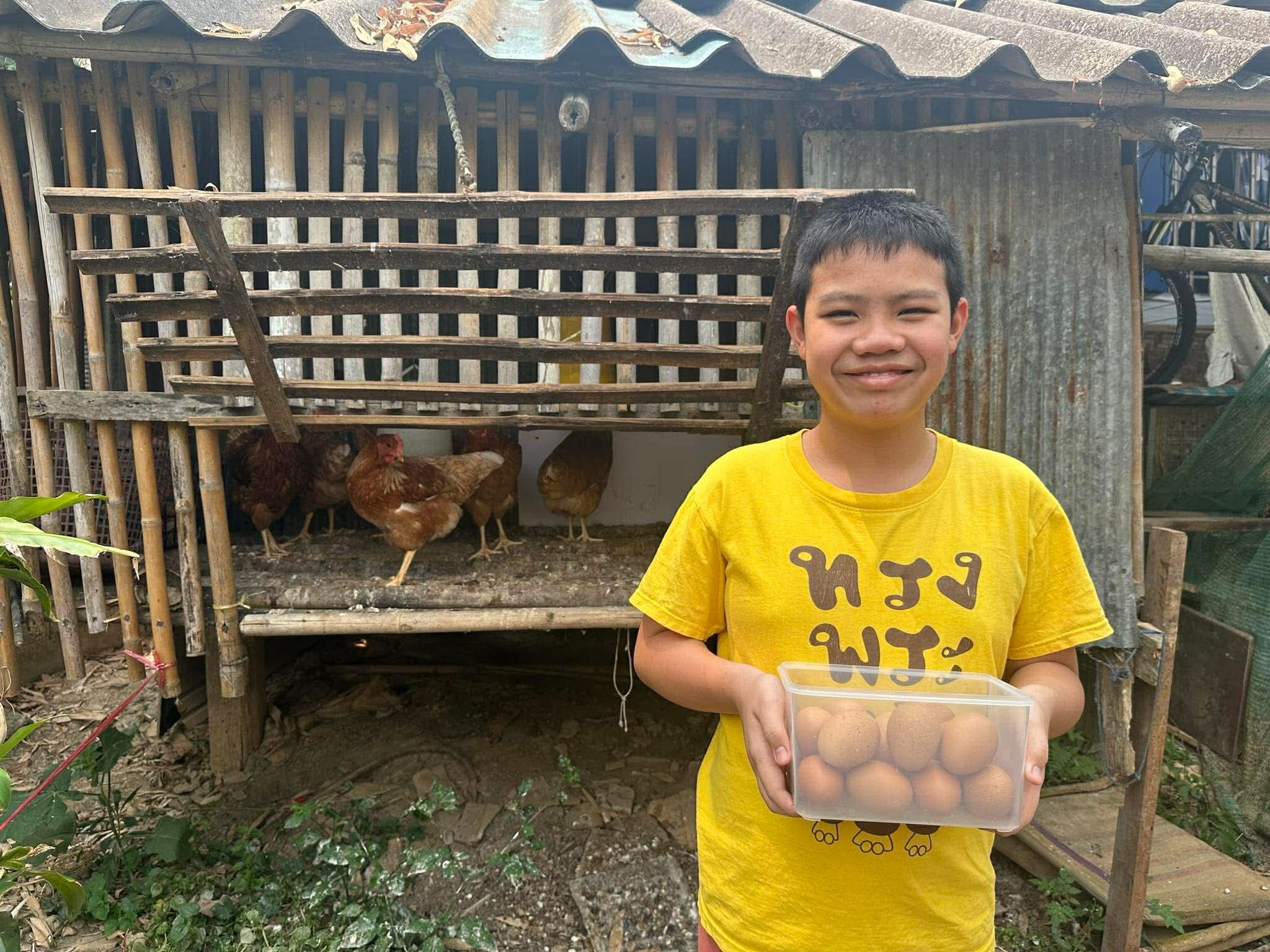 The children collected the chicken eggs to eat.