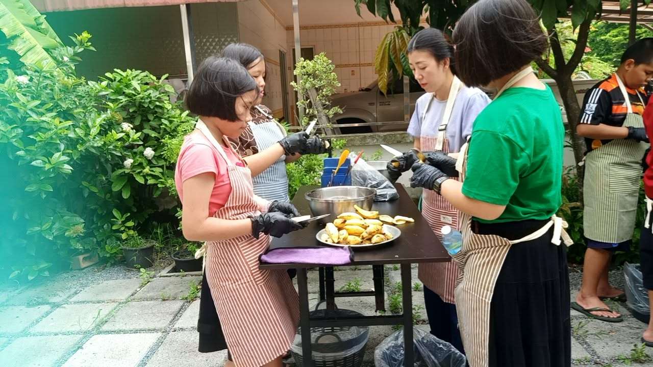 Wash the bananas and then peel them.