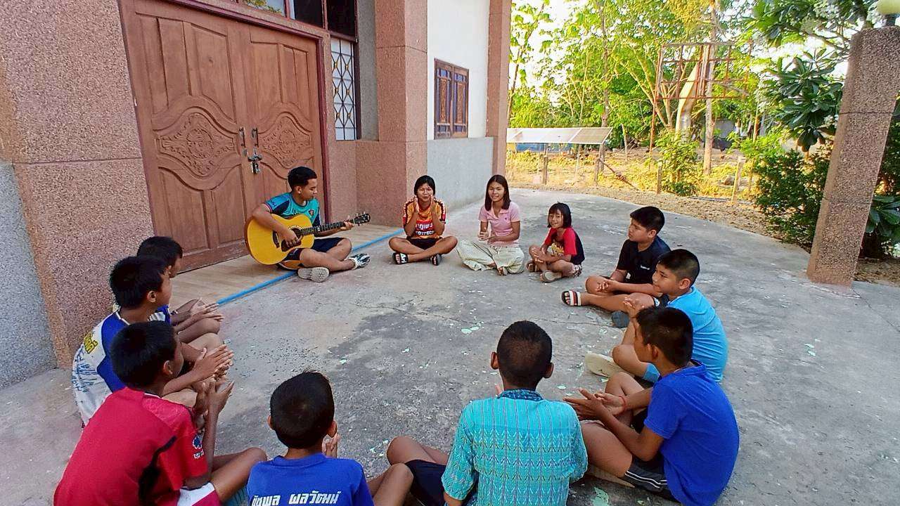 Children enjoy participating in their music class.