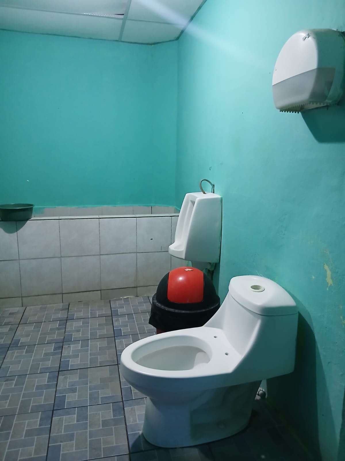 THE CURRENT MEN'S BATHROOM ONLY HAS ONE TOILET