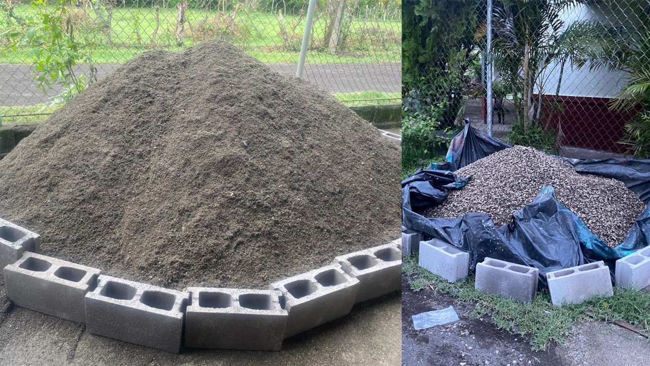 Arrival of sand and gravel for base preparation.