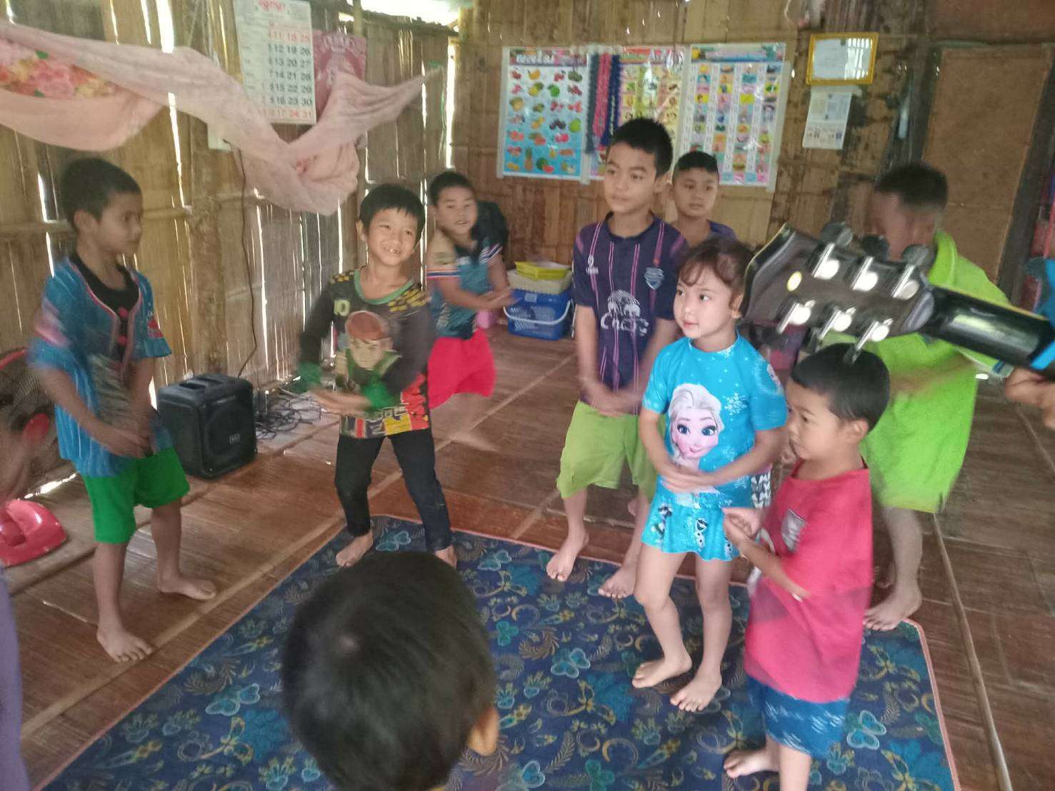 We have to sing and dance before eating.