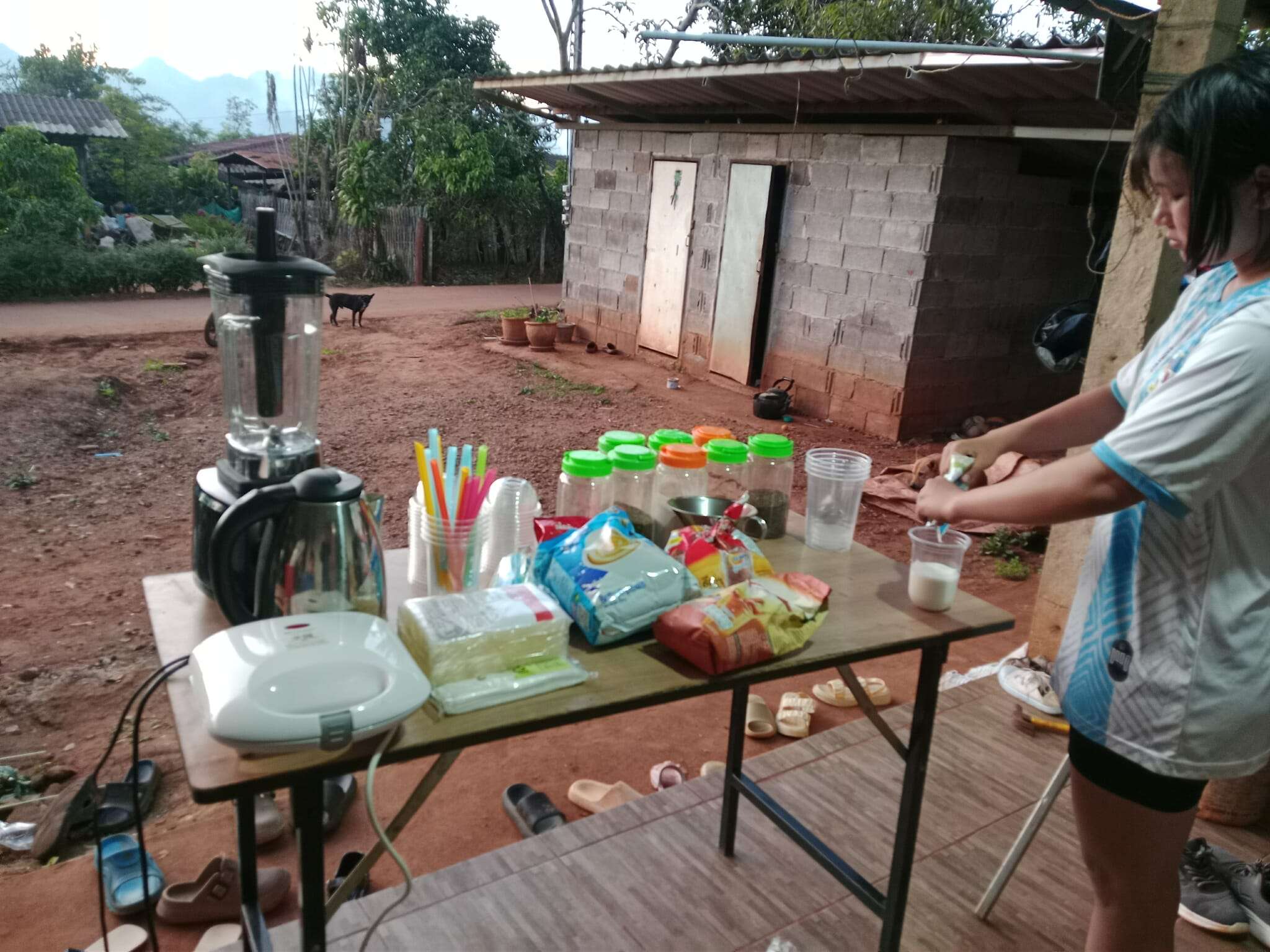Making and selling drinks to earn money.
