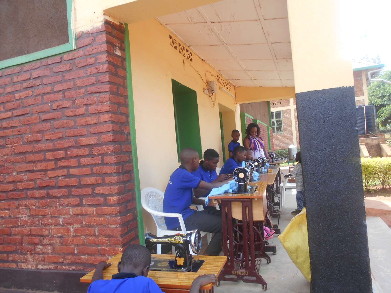 Some children are taught to sew outside the office