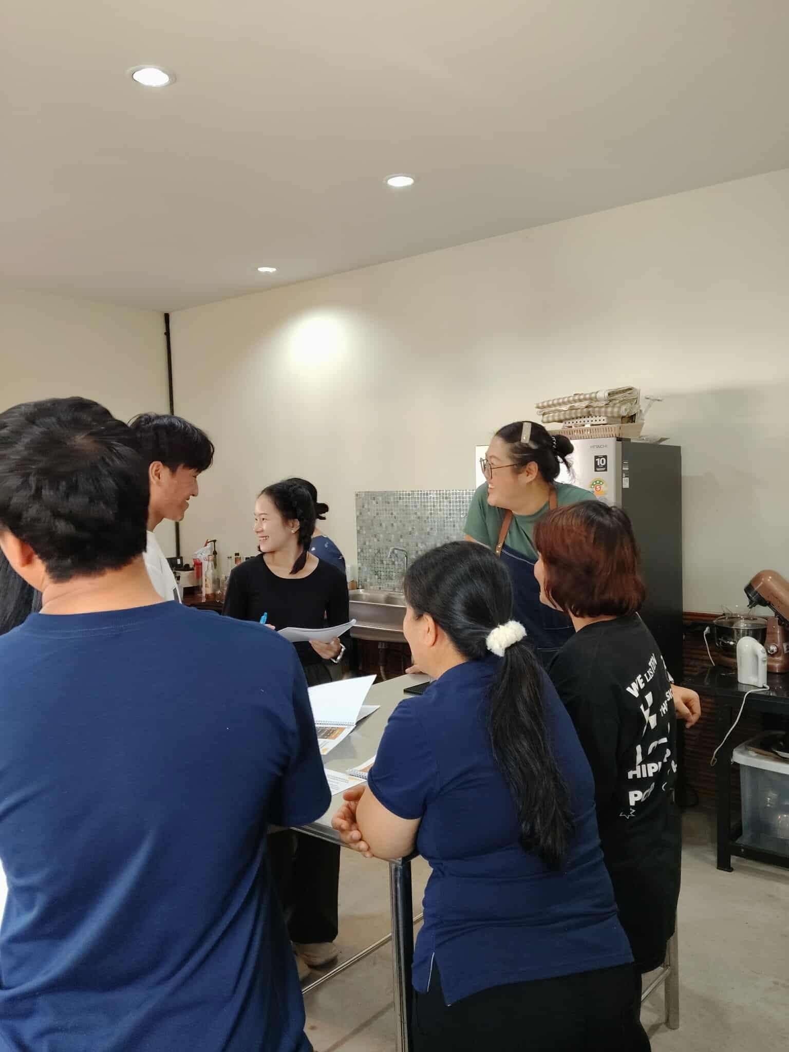 The youths wrote down recipes for desserts and drinks.