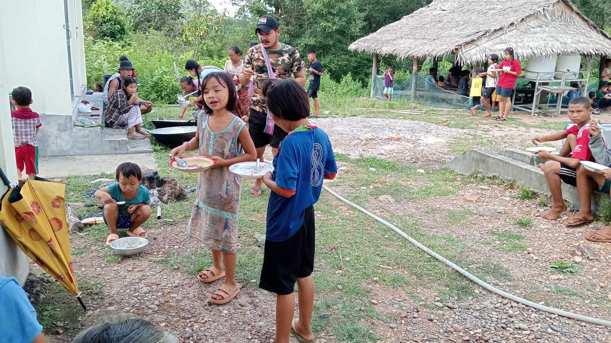 Since the cafeteria space is limited, the children have to spread out and eat.