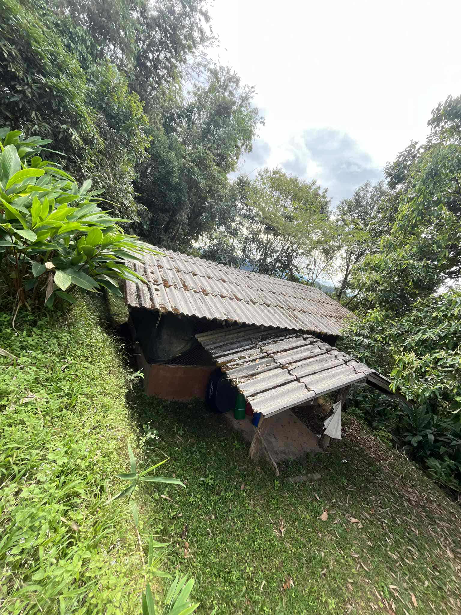 "The classroom roof is in disrepair, with multiple leaks causing water to seep in, highlighting the urgent need for repairs."