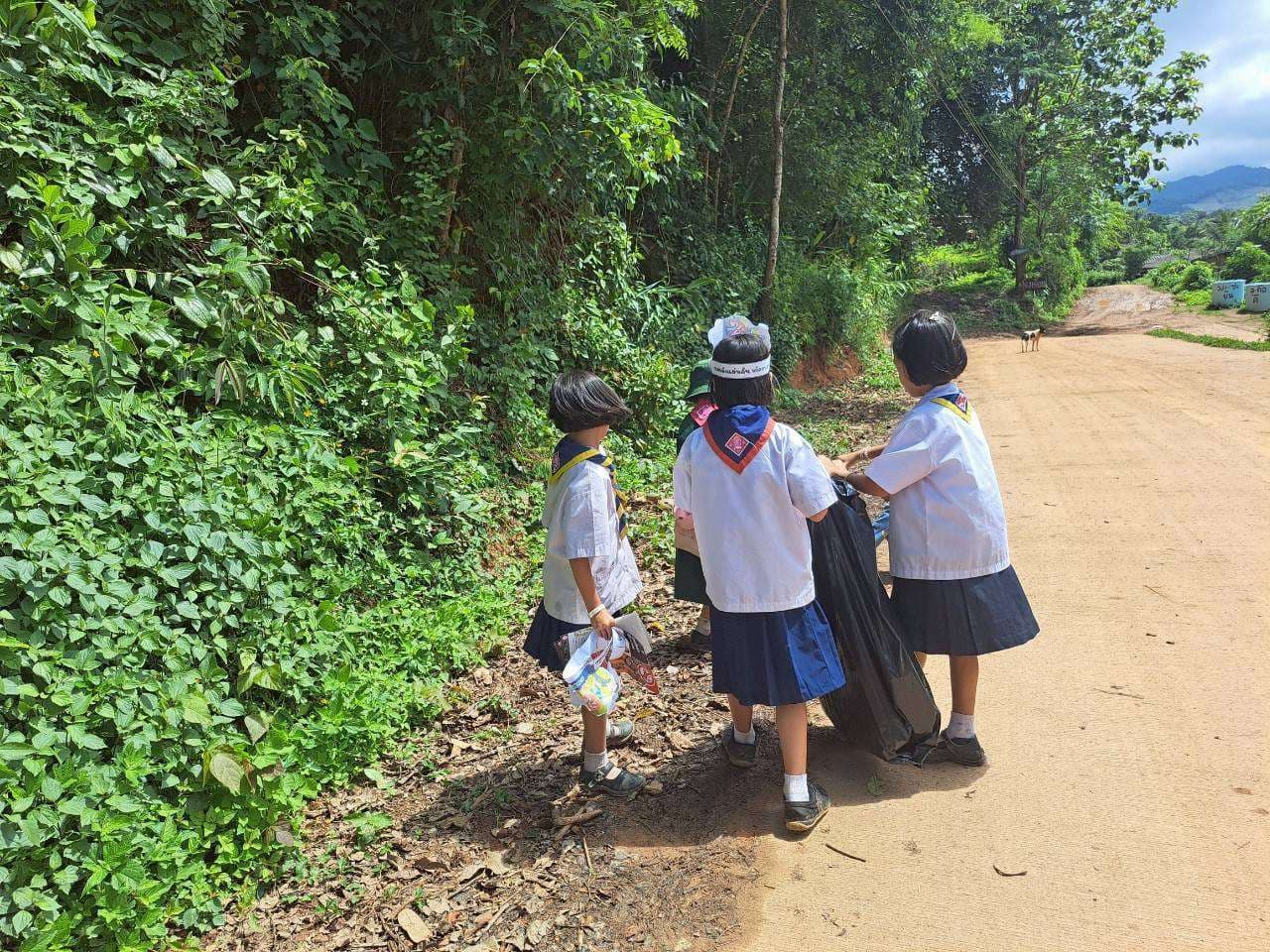 
"Making a difference: Children actively participating in our garbage collection project, learning the importance of cleanliness and environmental stewardship!