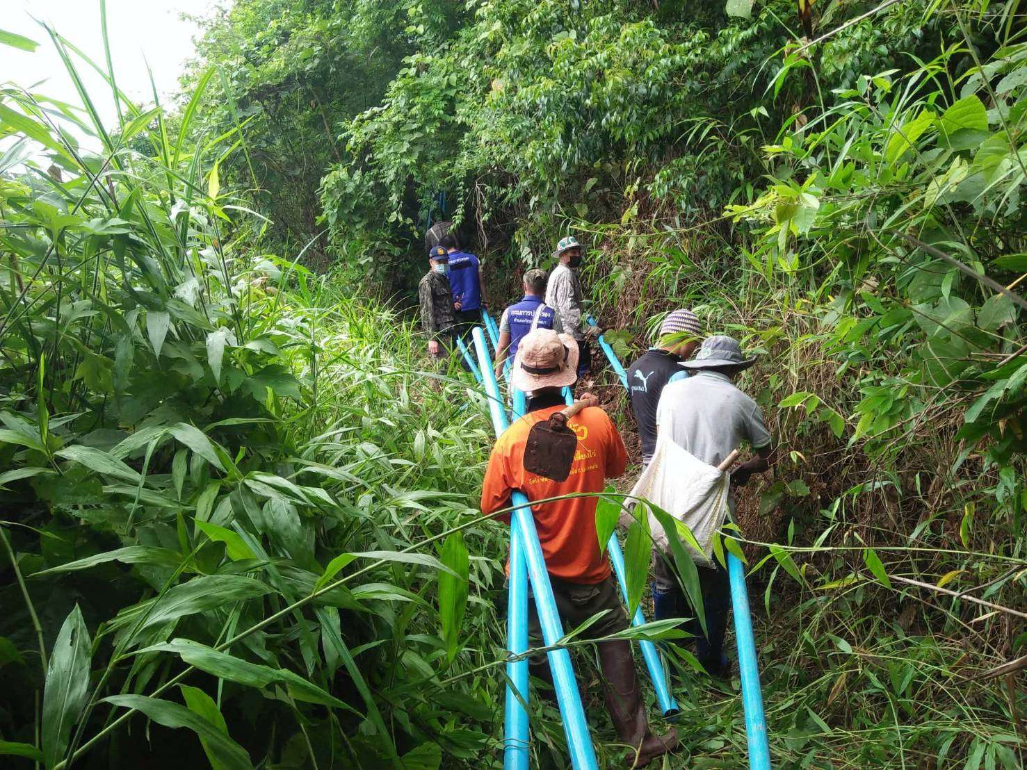 Children and parents were seen climbing pipes upstream.