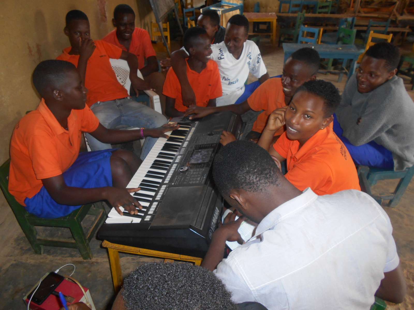 these children are learning to play the piano 