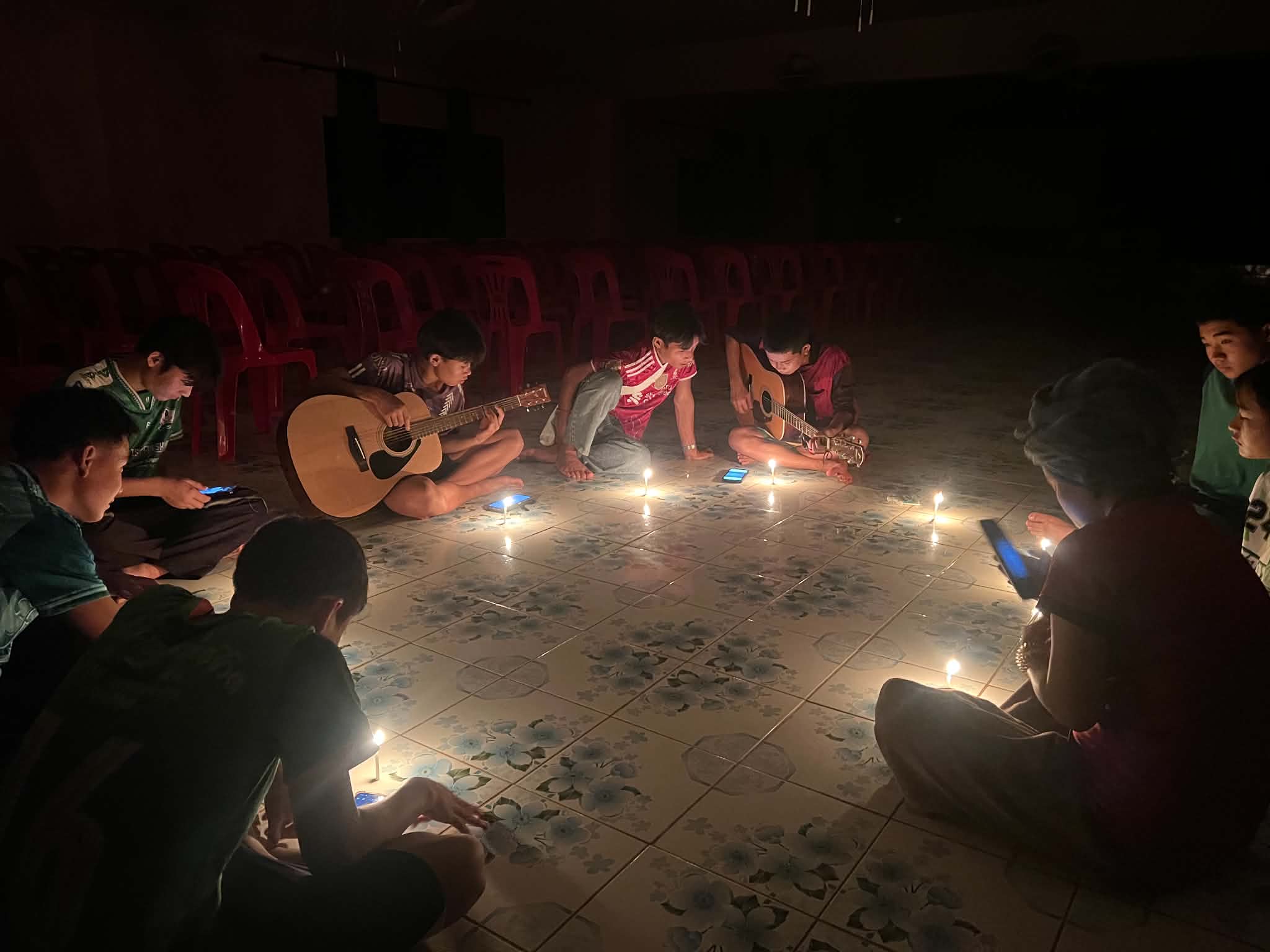 The worship team rehearsed worship songs with candle lighs