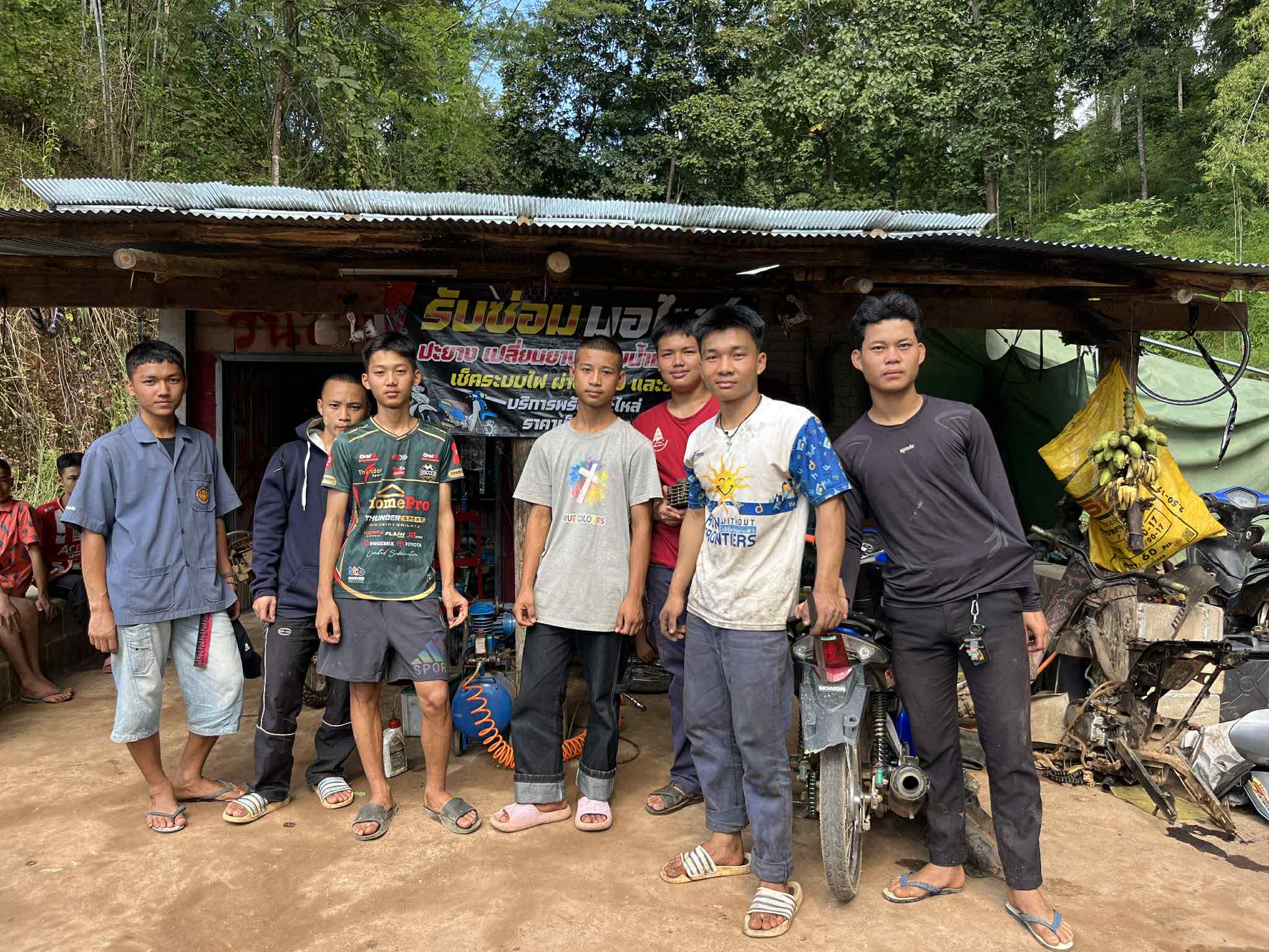 Teamwork in action: Chawit and his crew united in their motorcycle repair training!