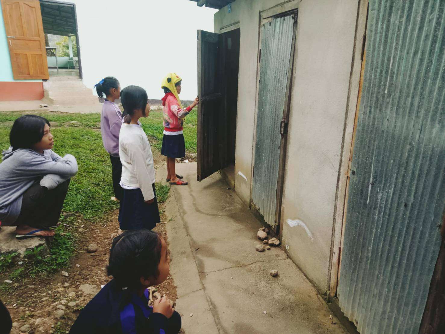 Children waiting to use the restroom