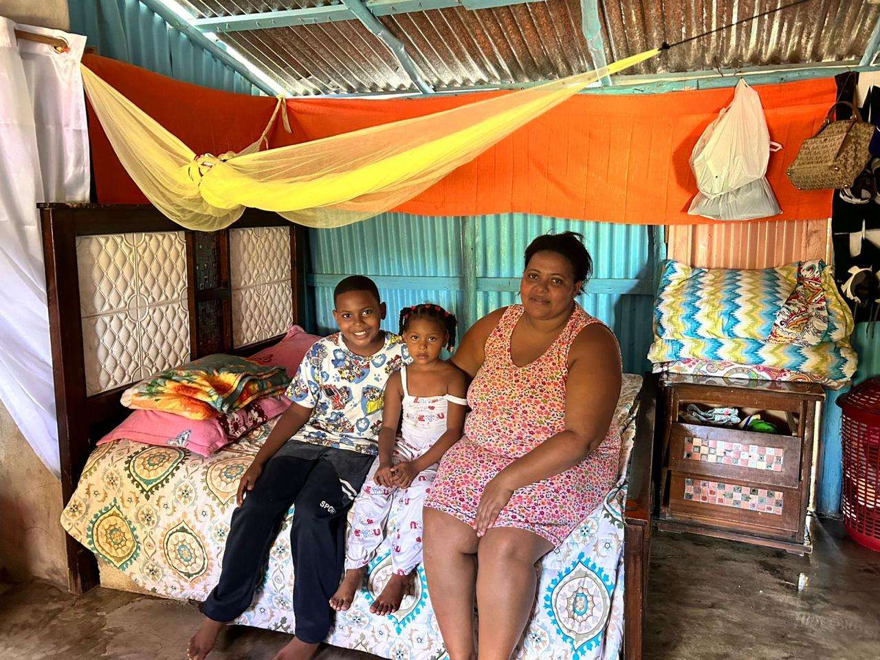 Parents and children share a single bed to rest in.