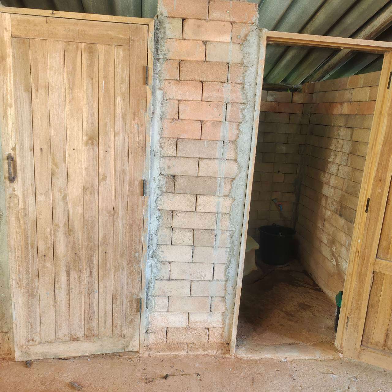 The bathroom has undergone several renovations over time, but the condition remains inadequate.