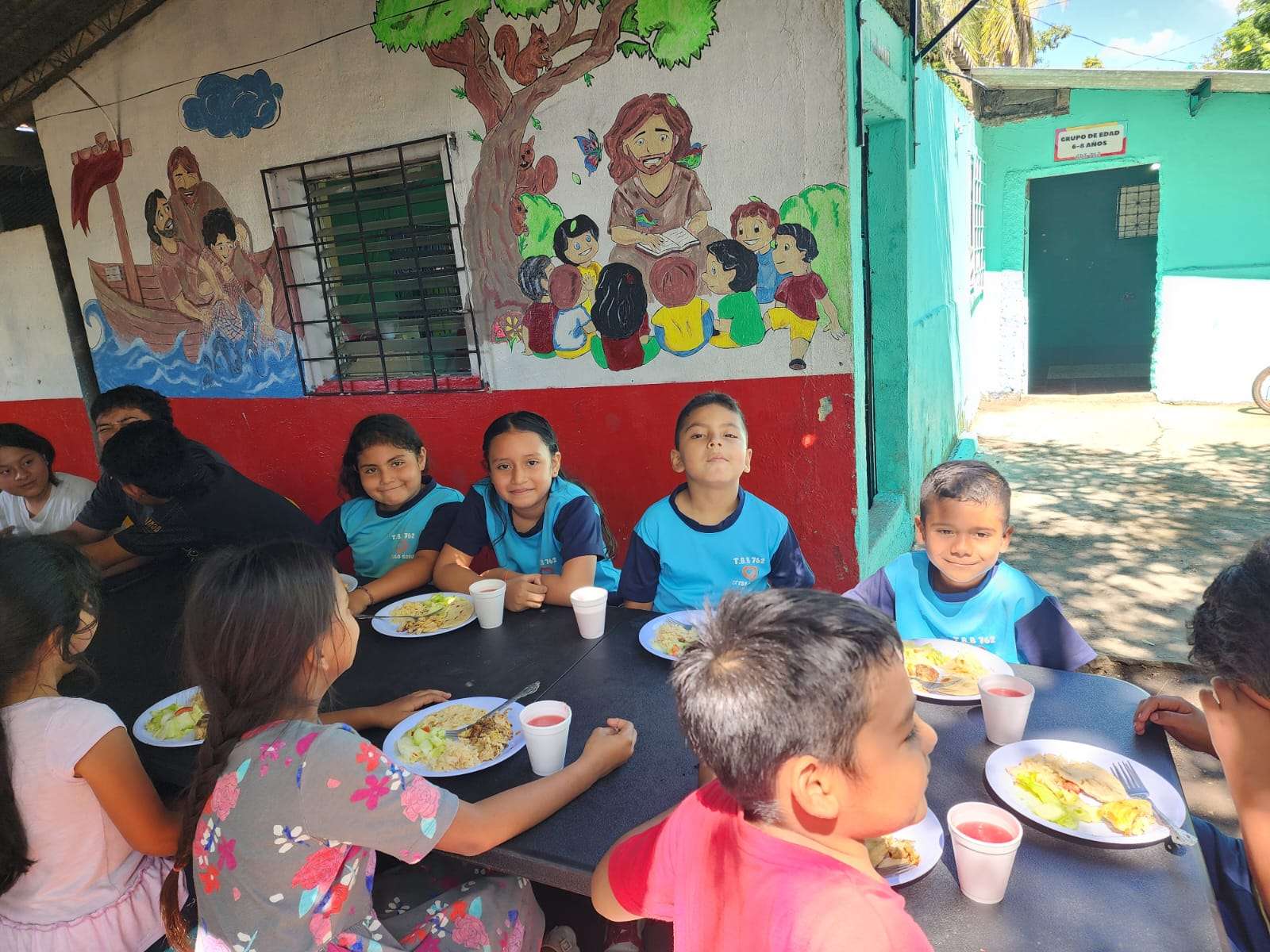 The children enjoy their food