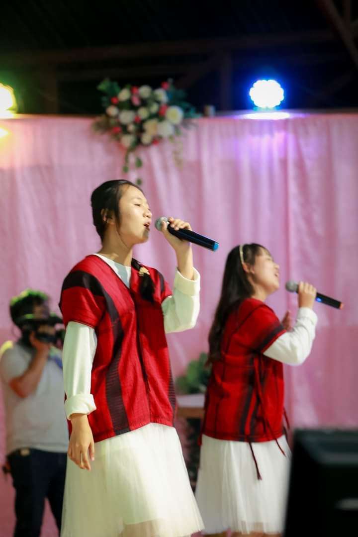 Leading worship outside the church.