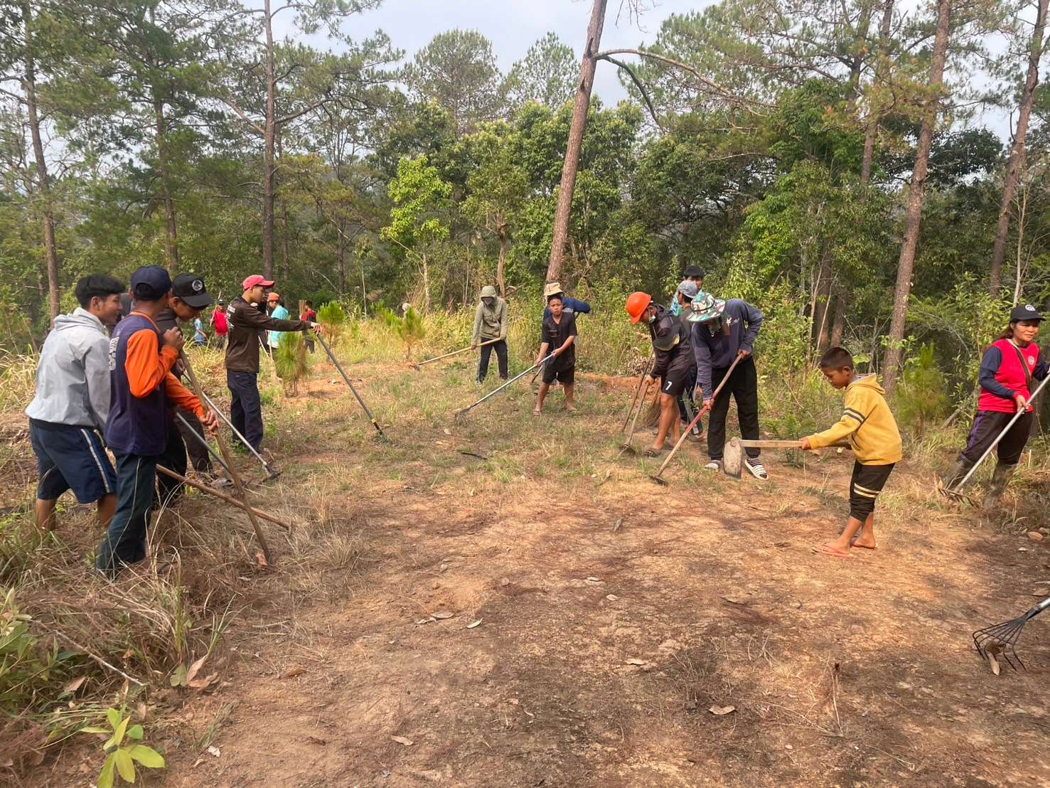 The youth group's work on digging a garbage pit