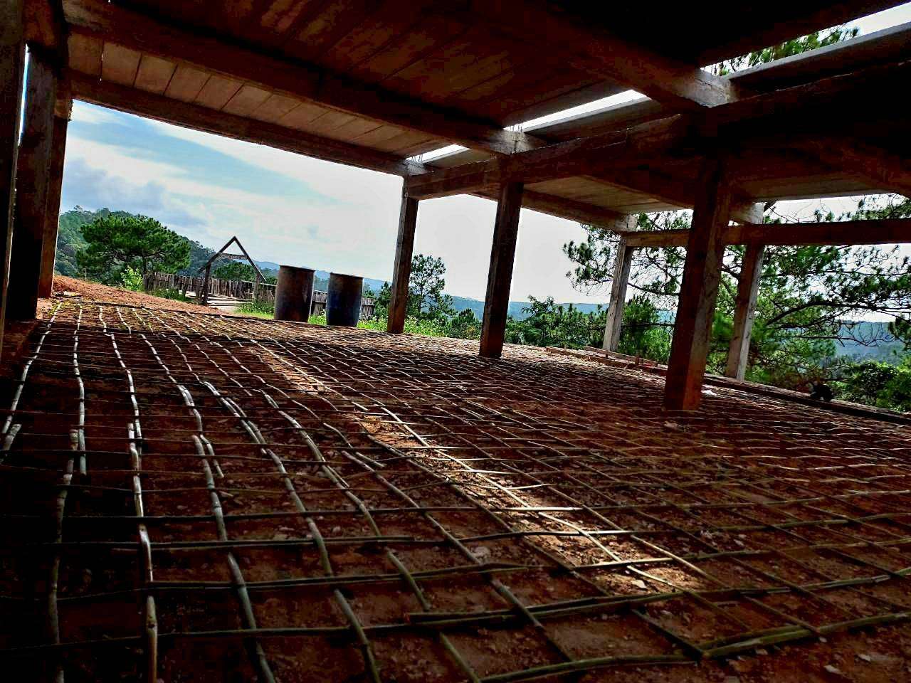 The foundation of the new building is laid to ensure strength and safety.