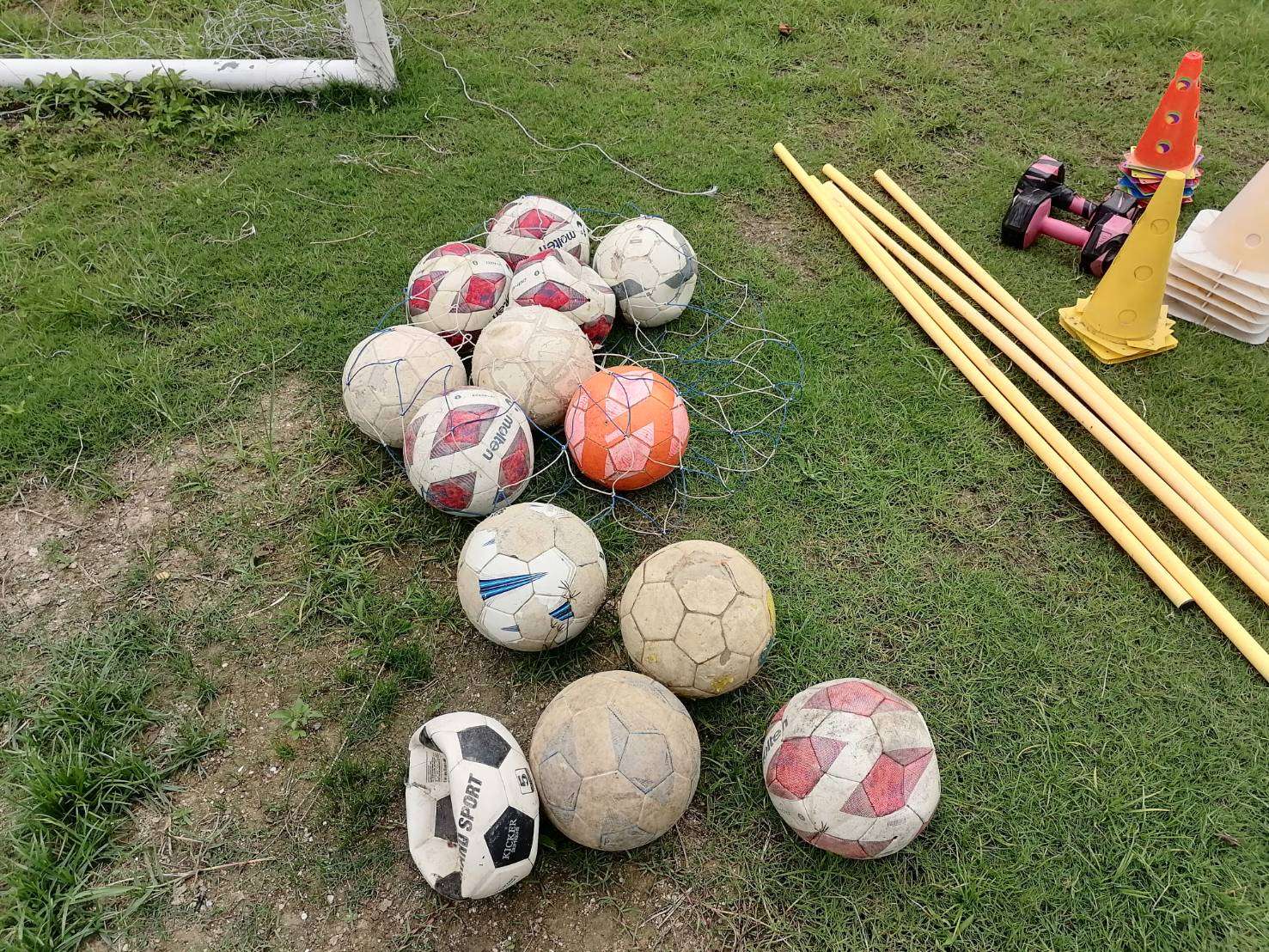 The footballs and training equipment are insufficient and old.