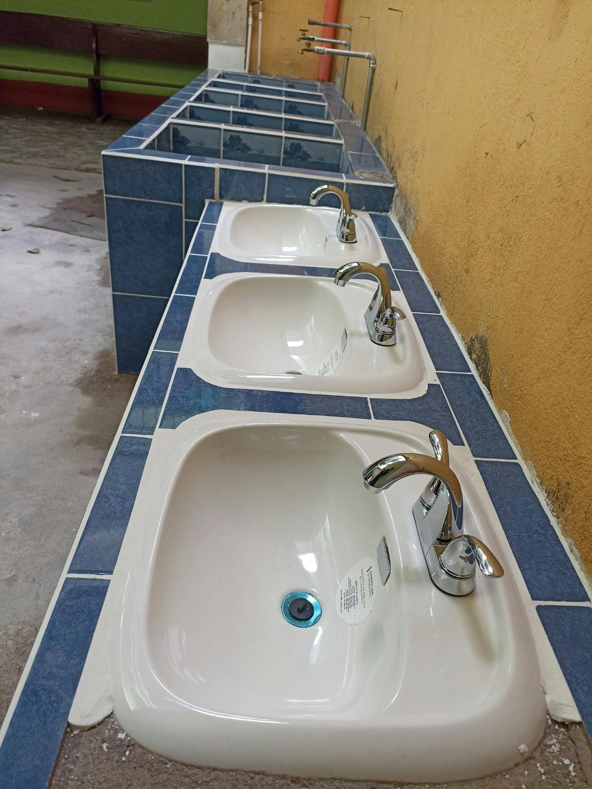 Completion of construction of sinks and cleaning area